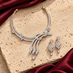 Jewellery styled on ivory travertine with burgundy silk